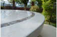 Table de jardin mosaïque ronde 125 160 emperador travertin MARBELLA